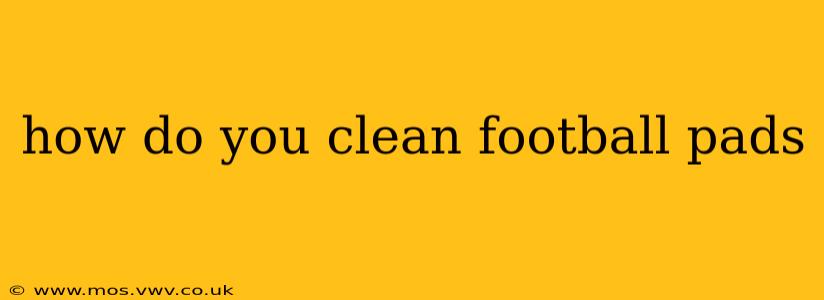 how do you clean football pads