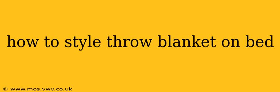 how to style throw blanket on bed