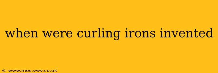 when were curling irons invented